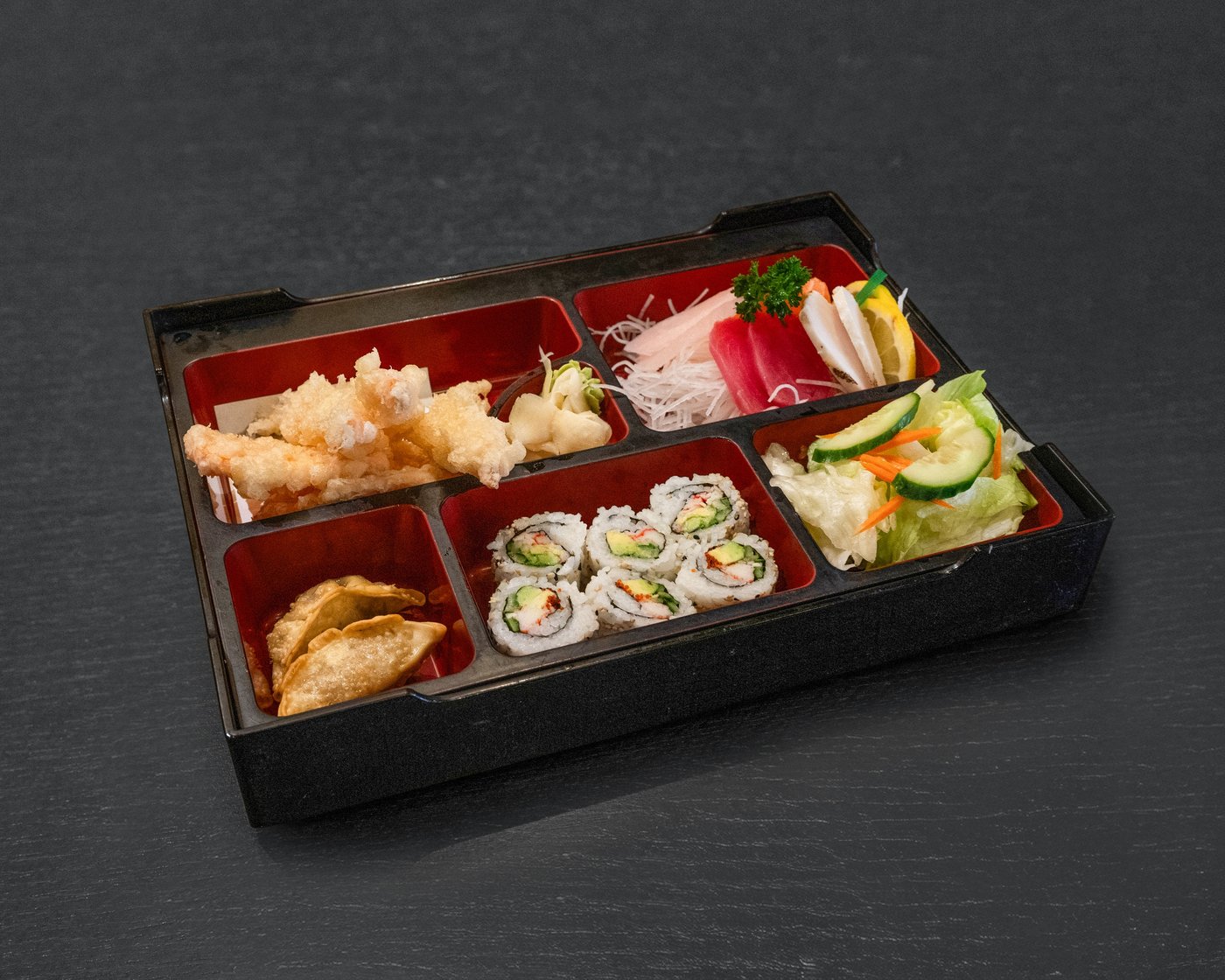 Sashimi Bento — assorted sashimi, tempura, gyoza, California roll & salad