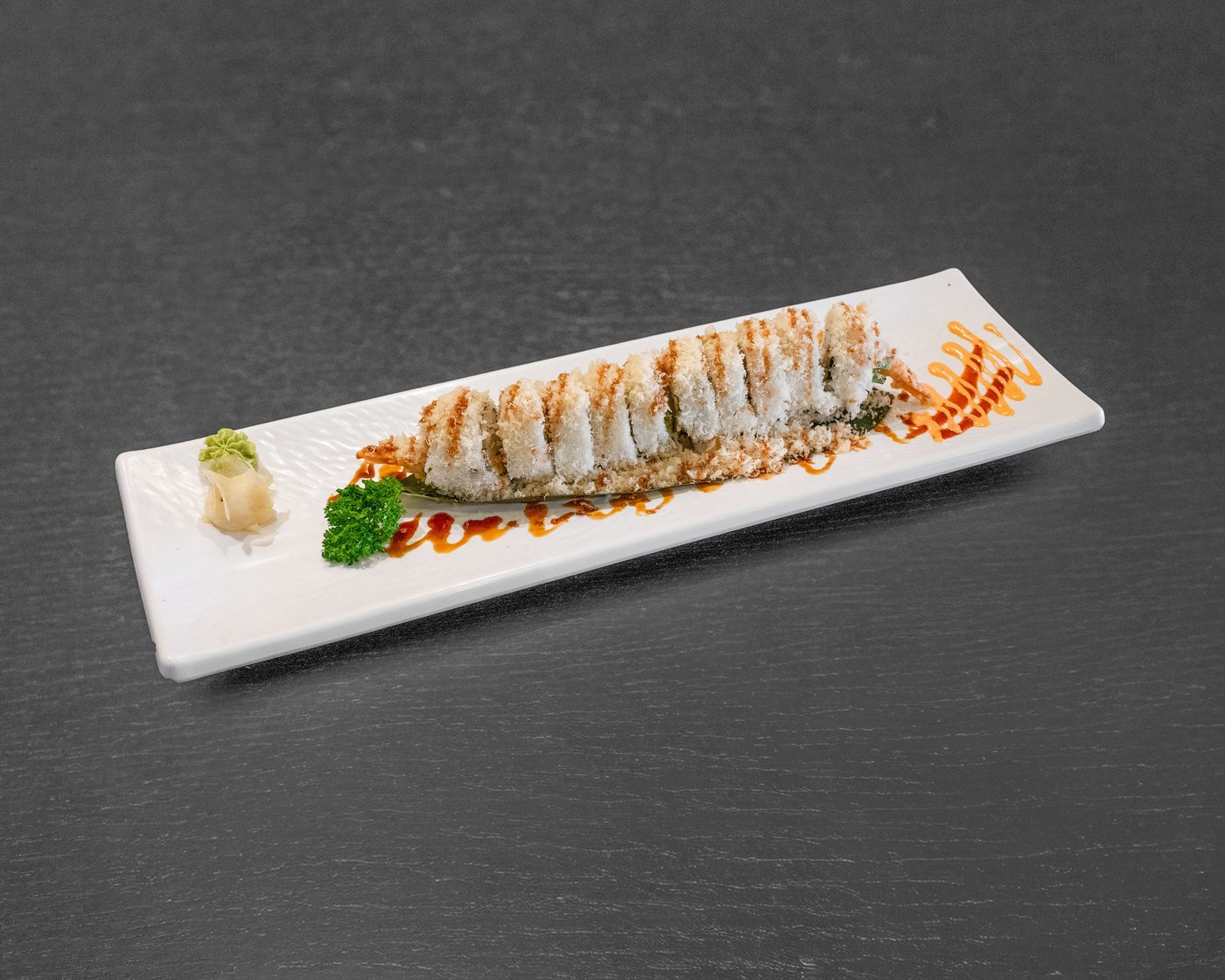 FM22 Crunch Roll — shrimp tempura, crab, avocado, fish roe, cucumber & tempura bits with unagi sauce
